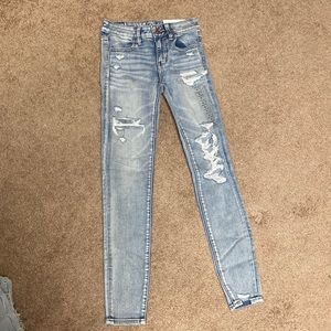 Light wash distressed jeans